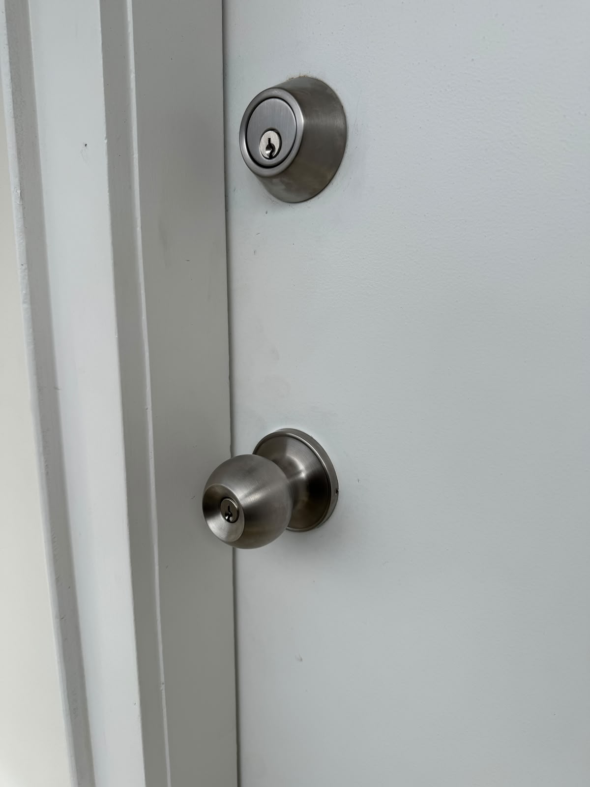 Fresh deadbolt and knobset for a Mount Eden flat door