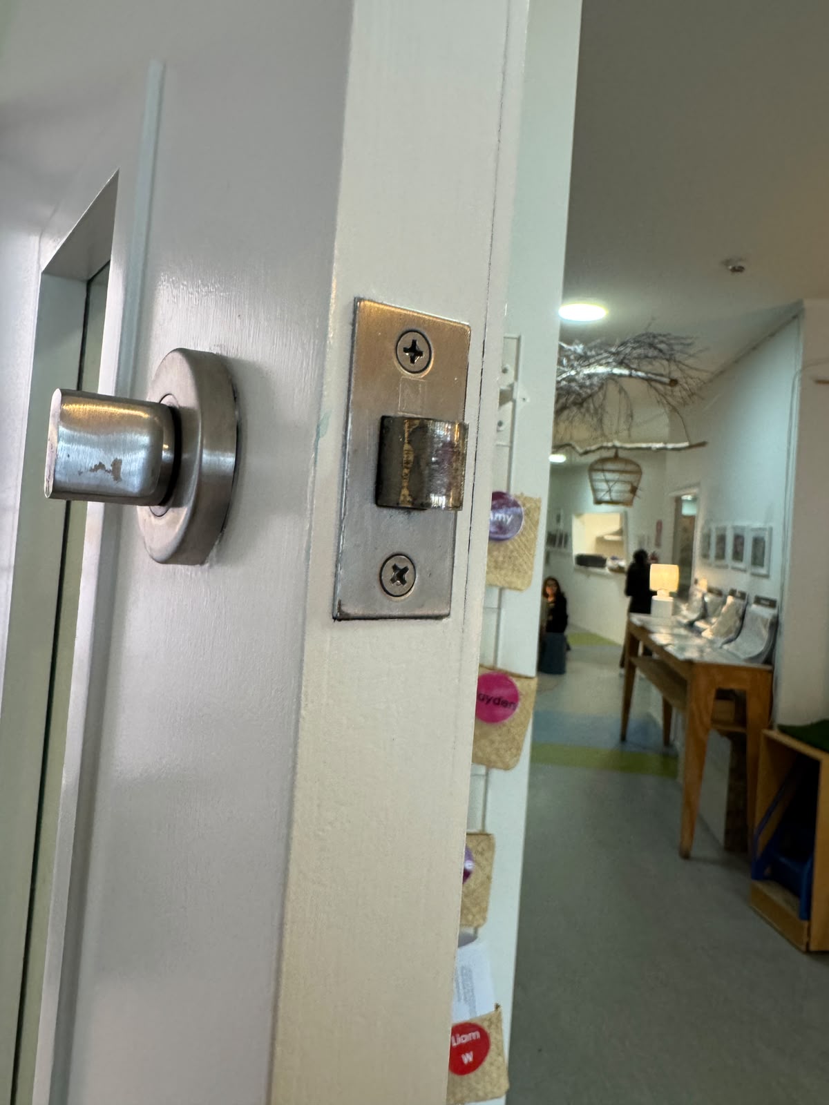 Worn commercial latch replaced at a Newmarket childcare centre